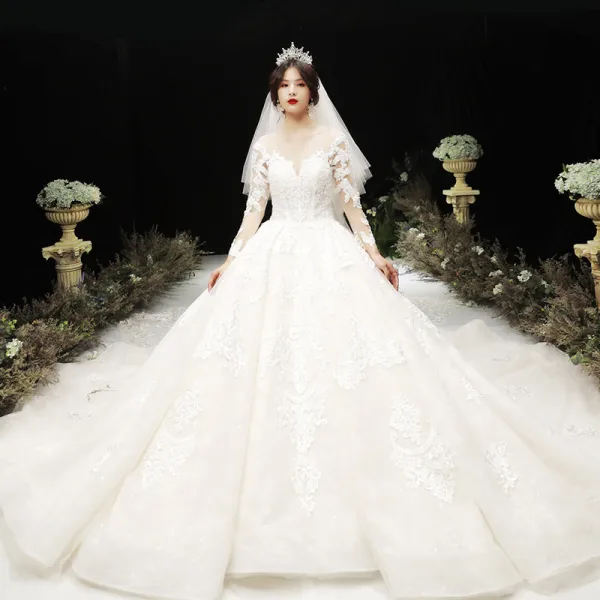 Luxury / Gorgeous Champagne See-through Wedding Dresses 2020 Ball Gown Scoop Neck Long Sleeve Pierced Appliques Lace Beading Royal Train Ruffle