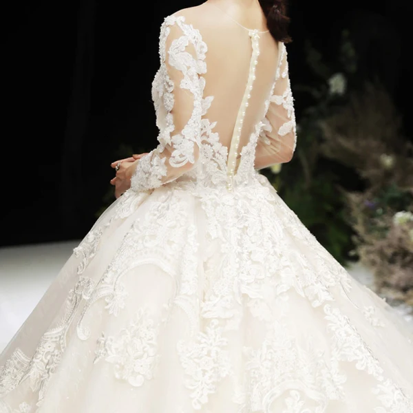 Luxury / Gorgeous Champagne See-through Wedding Dresses 2020 Ball Gown Scoop Neck Long Sleeve Pierced Appliques Lace Beading Royal Train Ruffle