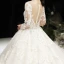 Luxury / Gorgeous Champagne See-through Wedding Dresses 2020 Ball Gown Scoop Neck Long Sleeve Pierced Appliques Lace Beading Royal Train Ruffle