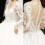 Luxury / Gorgeous Champagne See-through Wedding Dresses 2020 Ball Gown Scoop Neck Long Sleeve Pierced Appliques Lace Beading Royal Train Ruffle
