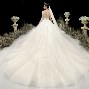 Charming Champagne See Through Wedding Dresses 2020 Ball Gown Scoop Neck 3 4 Sleeve Appliques Lace Beading Glitter Tulle Cathedral Train Ruffle