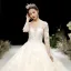 Charming Champagne See-through Wedding Dresses 2020 Ball Gown Scoop Neck 3/4 Sleeve Appliques Lace Beading Glitter Tulle Cathedral Train Ruffle
