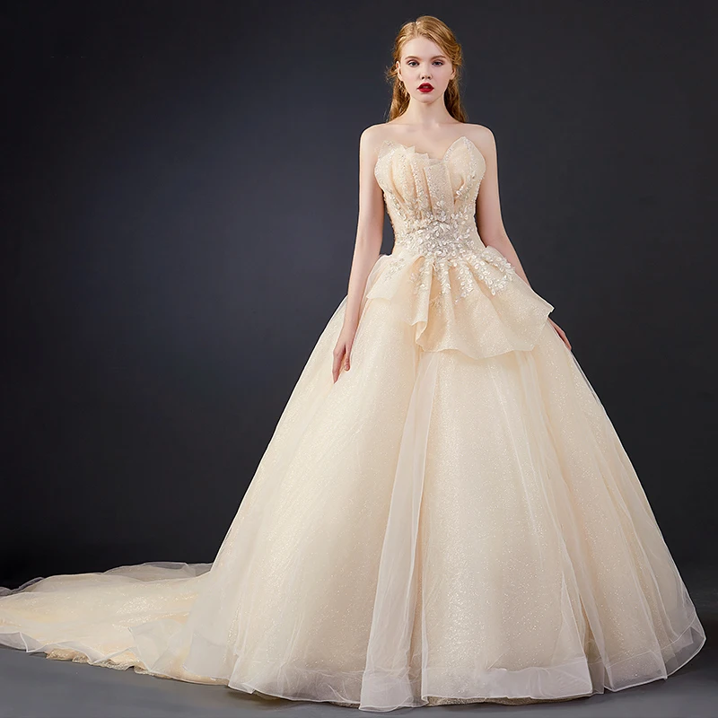 Luksus Champagne Brudekjoler 2020 Ballkjole Kjæreste Uten Ermer Ryggløse Glitter Tyll Appliques Blonder Beading Chapel Train Buste