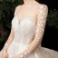 Fabuleux Champagne Transparentes Étoile Robe De Mariée 2020 Robe Boule Encolure Carrée Manches Longues Dos Nu Glitter Tulle Fait main Perlage Cathedral Train Volants