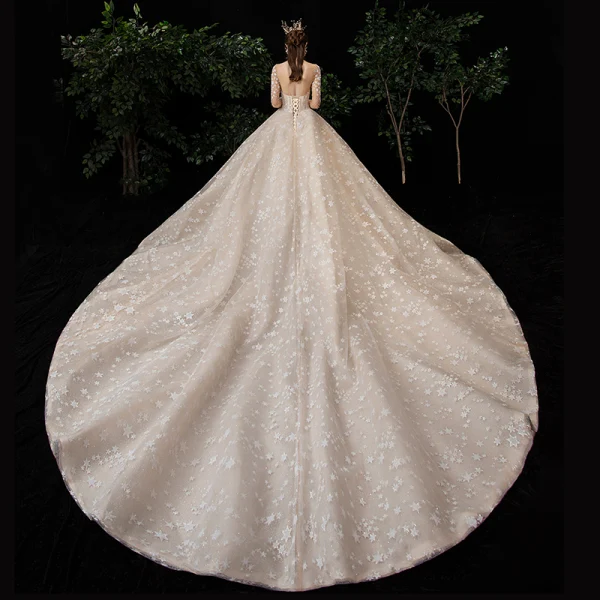 Fabuleux Champagne Transparentes Étoile Robe De Mariée 2020 Robe Boule Encolure Carrée Manches Longues Dos Nu Glitter Tulle Fait main Perlage Cathedral Train Volants