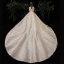 Fabuleux Champagne Transparentes Étoile Robe De Mariée 2020 Robe Boule Encolure Carrée Manches Longues Dos Nu Glitter Tulle Fait main Perlage Cathedral Train Volants
