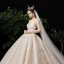 Fabuleux Champagne Transparentes Étoile Robe De Mariée 2020 Robe Boule Encolure Carrée Manches Longues Dos Nu Glitter Tulle Fait main Perlage Cathedral Train Volants