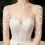 Fabuleux Champagne Transparentes Étoile Robe De Mariée 2020 Robe Boule Encolure Carrée Manches Longues Dos Nu Glitter Tulle Fait main Perlage Cathedral Train Volants