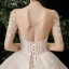 Fabuleux Champagne Transparentes Étoile Robe De Mariée 2020 Robe Boule Encolure Carrée Manches Longues Dos Nu Glitter Tulle Fait main Perlage Cathedral Train Volants