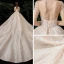Fabuleux Champagne Transparentes Étoile Robe De Mariée 2020 Robe Boule Encolure Carrée Manches Longues Dos Nu Glitter Tulle Fait main Perlage Cathedral Train Volants