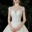 Meilleur Champagne Dentelle Robe De Mariée 2020 Robe Boule Transparentes Encolure Carrée Manches Courtes Appliques En Dentelle Perlage Chapel Train Volants
