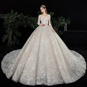 Charmant Champagne Transparentes Robe De Mariée 2020 Robe Boule Encolure Dégagée Manches Longues Dos Nu Glitter Tulle Appliques En Dentelle Perlage Royal Train Volants