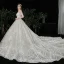Charmant Champagne Transparentes Robe De Mariée 2020 Robe Boule Encolure Dégagée Manches Longues Dos Nu Glitter Tulle Appliques En Dentelle Perlage Royal Train Volants