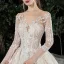 Charmant Champagne Transparentes Robe De Mariée 2020 Robe Boule Encolure Dégagée Manches Longues Dos Nu Glitter Tulle Appliques En Dentelle Perlage Royal Train Volants