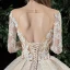Charmant Champagne Transparentes Robe De Mariée 2020 Robe Boule Encolure Dégagée Manches Longues Dos Nu Glitter Tulle Appliques En Dentelle Perlage Royal Train Volants