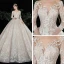 Charmant Champagne Transparentes Robe De Mariée 2020 Robe Boule Encolure Dégagée Manches Longues Dos Nu Glitter Tulle Appliques En Dentelle Perlage Royal Train Volants