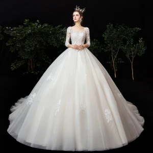 High End Champagne See Through Wedding Dresses 2020 Ball Gown Square Neckline 3 4 Sleeve Backless Pierced Appliques Lace Chapel Train Ruffle