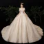 Luxe Champagne Robe De Mariée 2020 Robe Boule De l'épaule Manches Courtes Dos Nu Perlage Glitter Paillettes Tulle Royal Train Volants