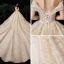 Luxe Champagne Robe De Mariée 2020 Robe Boule De l'épaule Manches Courtes Dos Nu Perlage Glitter Paillettes Tulle Royal Train Volants
