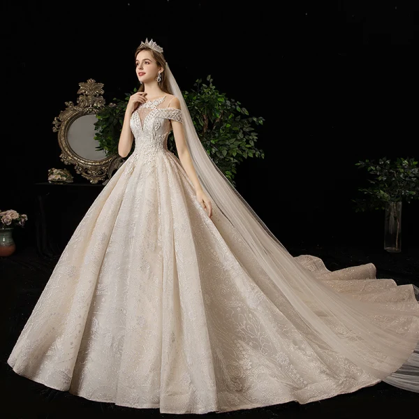 Luxury / Gorgeous Champagne See-through Wedding Dresses 2020 Ball Gown Scoop Neck Short Sleeve Backless Glitter Appliques Lace Beading Tassel Chapel Train Ruffle