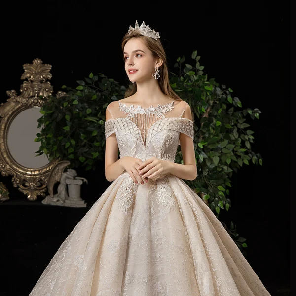 Luxury / Gorgeous Champagne See-through Wedding Dresses 2020 Ball Gown Scoop Neck Short Sleeve Backless Glitter Appliques Lace Beading Tassel Chapel Train Ruffle