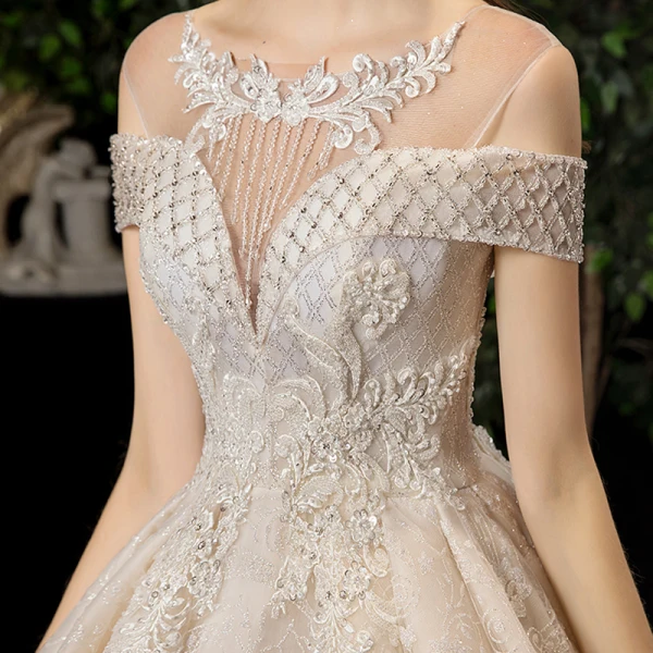 Luxury / Gorgeous Champagne See-through Wedding Dresses 2020 Ball Gown Scoop Neck Short Sleeve Backless Glitter Appliques Lace Beading Tassel Chapel Train Ruffle