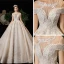 Luxury / Gorgeous Champagne See-through Wedding Dresses 2020 Ball Gown Scoop Neck Short Sleeve Backless Glitter Appliques Lace Beading Tassel Chapel Train Ruffle