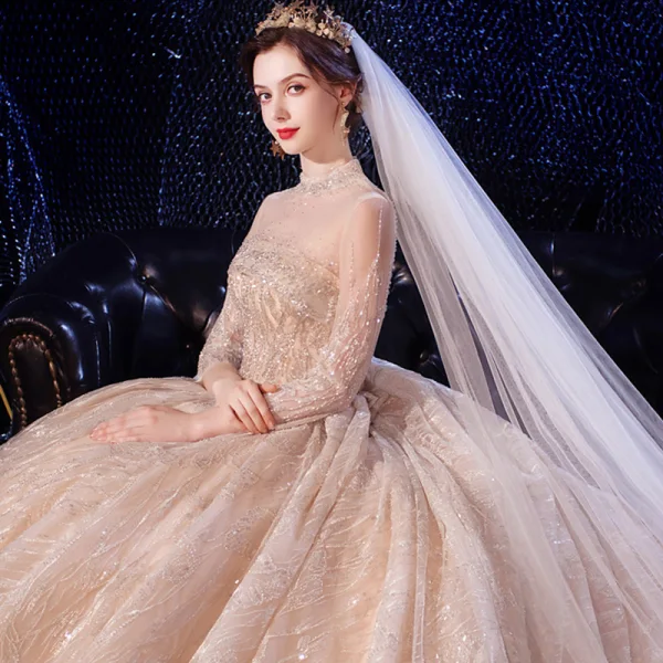 Luxe Champagne Transparentes Robe De Mariée 2020 Robe Boule Col Haut 3/4 Manches Dos Nu Glitter Appliques En Dentelle Fait main Perlage Royal Train Volants
