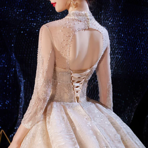 Luxe Champagne Transparentes Robe De Mariée 2020 Robe Boule Col Haut 3/4 Manches Dos Nu Glitter Appliques En Dentelle Fait main Perlage Royal Train Volants