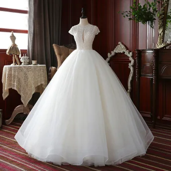 High End Champagne Outdoor Garden Wedding Dresses 2020 Ball Gown Scoop Neck Short Sleeve Backless Handmade Beading Floor Length Long Ruffle