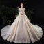 Vintage / Retro Champagne See-through Wedding Dresses 2020 Ball Gown High Neck Long Sleeve Backless Glitter Tulle Appliques Lace Beading Royal Train Ruffle