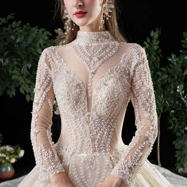 Vintage / Retro Champagne See-through Wedding Dresses 2020 Ball Gown High Neck Long Sleeve Backless Glitter Tulle Appliques Lace Beading Royal Train Ruffle