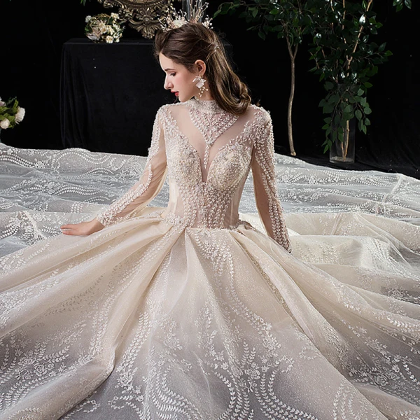 Vintage / Retro Champagne See-through Wedding Dresses 2020 Ball Gown High Neck Long Sleeve Backless Glitter Tulle Appliques Lace Beading Royal Train Ruffle