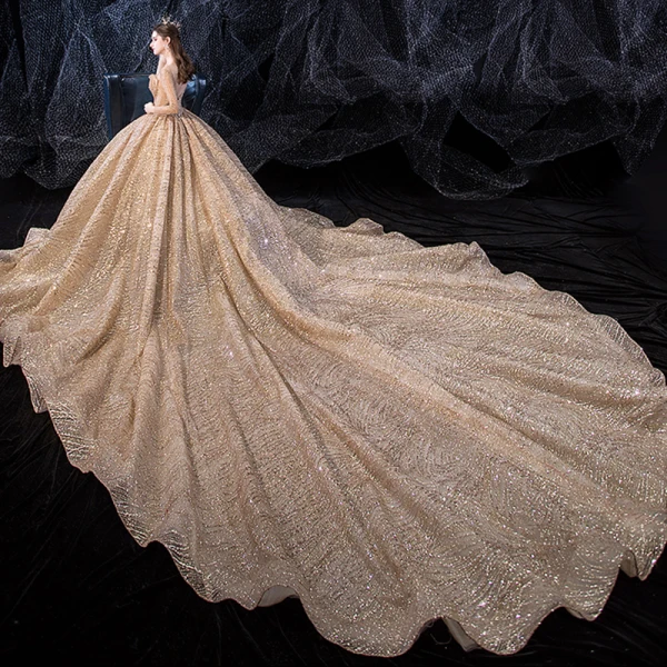 Scintillantes Champagne Transparentes Robe De Mariée 2020 Robe Boule Encolure Carrée Manches Longues Dos Nu Glitter Tulle Paillettes Perlage Royal Train Volants