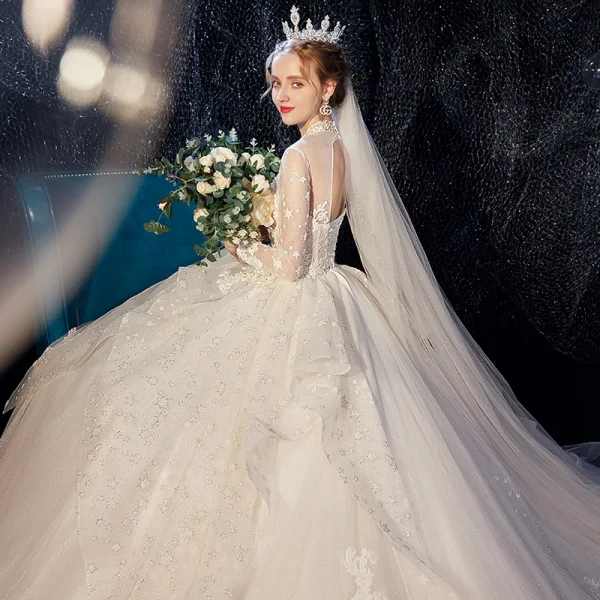 Vintage / Originale Ivoire Transparentes Robe De Mariée 2020 Robe Boule Col Haut Manches Longues Dos Nu Glitter Tulle Appliques En Dentelle Perlage Chapel Train Volants