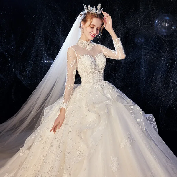 Vintage / Originale Ivoire Transparentes Robe De Mariée 2020 Robe Boule Col Haut Manches Longues Dos Nu Glitter Tulle Appliques En Dentelle Perlage Chapel Train Volants