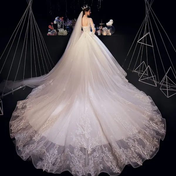 Illusion Ivoire Transparentes Robe De Mariée 2020 Princesse Encolure Dégagée 3/4 Manches Dos Nu Glitter Tulle Appliques En Dentelle Perlage Cathedral Train Volants