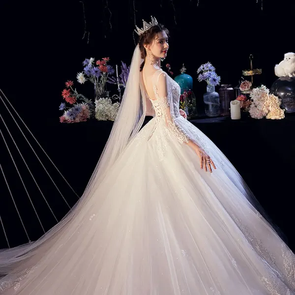 Illusion Ivoire Transparentes Robe De Mariée 2020 Princesse Encolure Dégagée 3/4 Manches Dos Nu Glitter Tulle Appliques En Dentelle Perlage Cathedral Train Volants