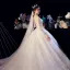 Illusion Ivoire Transparentes Robe De Mariée 2020 Princesse Encolure Dégagée 3/4 Manches Dos Nu Glitter Tulle Appliques En Dentelle Perlage Cathedral Train Volants