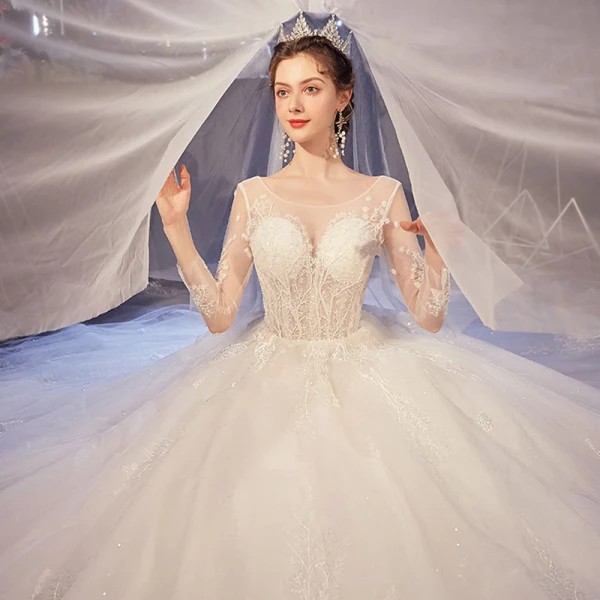 Illusion Ivoire Transparentes Robe De Mariée 2020 Princesse Encolure Dégagée 3/4 Manches Dos Nu Glitter Tulle Appliques En Dentelle Perlage Cathedral Train Volants