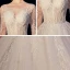 Illusion Ivoire Transparentes Robe De Mariée 2020 Princesse Encolure Dégagée 3/4 Manches Dos Nu Glitter Tulle Appliques En Dentelle Perlage Cathedral Train Volants