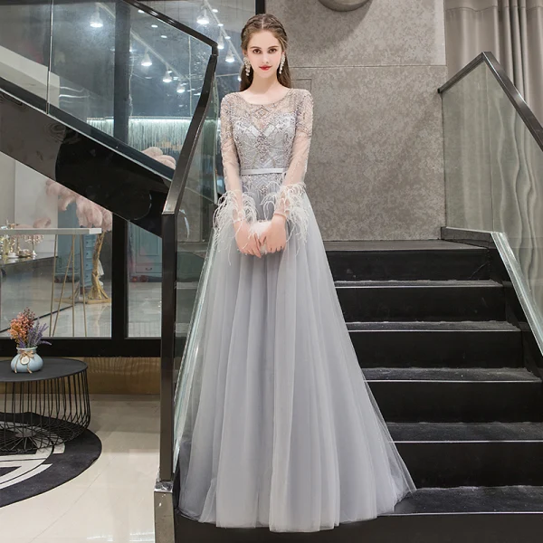 Haut de Gamme Gris Transparentes Robe De Soirée 2020 Princesse Encolure Dégagée Manches Longues Plumes Perlage Longue Volants Robe De Ceremonie