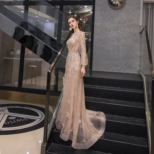 Haut de Gamme Doré Transparentes Robe De Soirée 2020 Princesse Encolure Dégagée Gonflée Manches Longues Étoile Perlage Faux Diamant Train De Balayage Volants Robe De Ceremonie