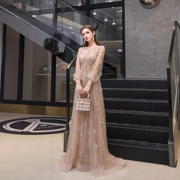 Haut de Gamme Doré Transparentes Robe De Soirée 2020 Princesse Encolure Dégagée Gonflée Manches Longues Étoile Perlage Faux Diamant Train De Balayage Volants Robe De Ceremonie