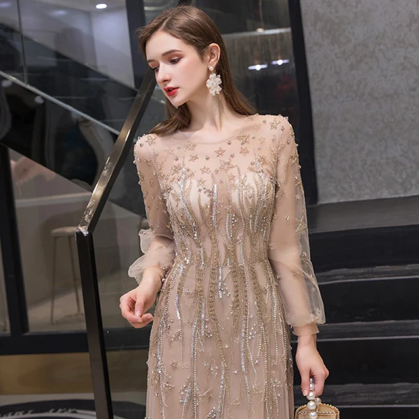 Haut de Gamme Doré Transparentes Robe De Soirée 2020 Princesse Encolure Dégagée Gonflée Manches Longues Étoile Perlage Faux Diamant Train De Balayage Volants Robe De Ceremonie