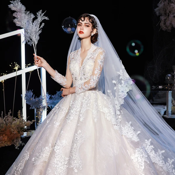 Illusion Champagne Transparentes Robe De Mariée 2020 Robe Boule V-Cou 3/4 Manches Dos Nu Appliques En Dentelle Perlage Cathedral Train Volants