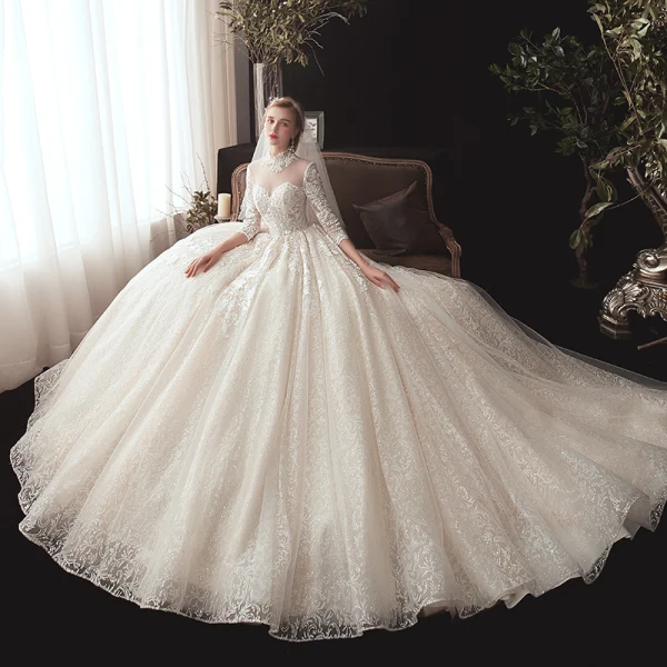 Vintage / Retro Champagne See-through Wedding Dresses 2020 Ball Gown High Neck 3/4 Sleeve Backless Glitter Tulle Appliques Lace Beading Chapel Train Ruffle
