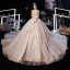 Luxe Champagne Robe De Mariée 2020 Robe Boule Transparentes Encolure Dégagée 3/4 Manches Dos Nu Glitter Tulle Appliques En Dentelle Perlage Cathedral Train Volants
