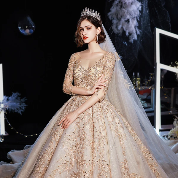 Luxe Champagne Robe De Mariée 2020 Robe Boule Transparentes Encolure Dégagée 3/4 Manches Dos Nu Glitter Tulle Appliques En Dentelle Perlage Cathedral Train Volants
