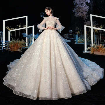 Victorian Style Champagne See Through Wedding Dresses 2020 Ball Gown High Neck Puffy Long Sleeve Backless Glitter Tulle Appliques Lace Beading Cathedral Train Ruffle